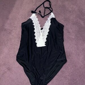 Low cut one peice LAST CHANCE BEFORE ITS DONATED